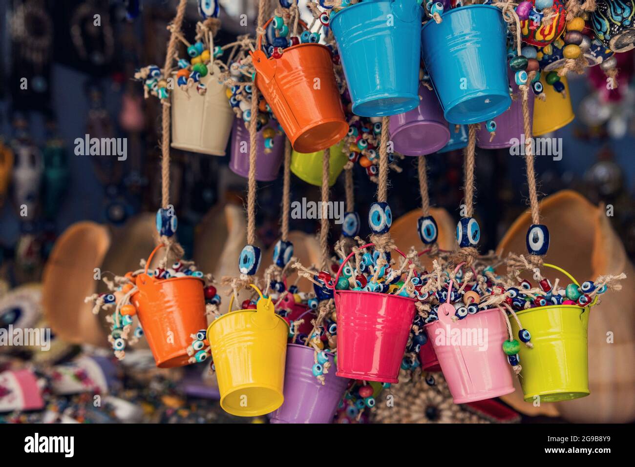 Colorful handmade  amulet decorations in a outdoor souvenir shop, close up Stock Photo