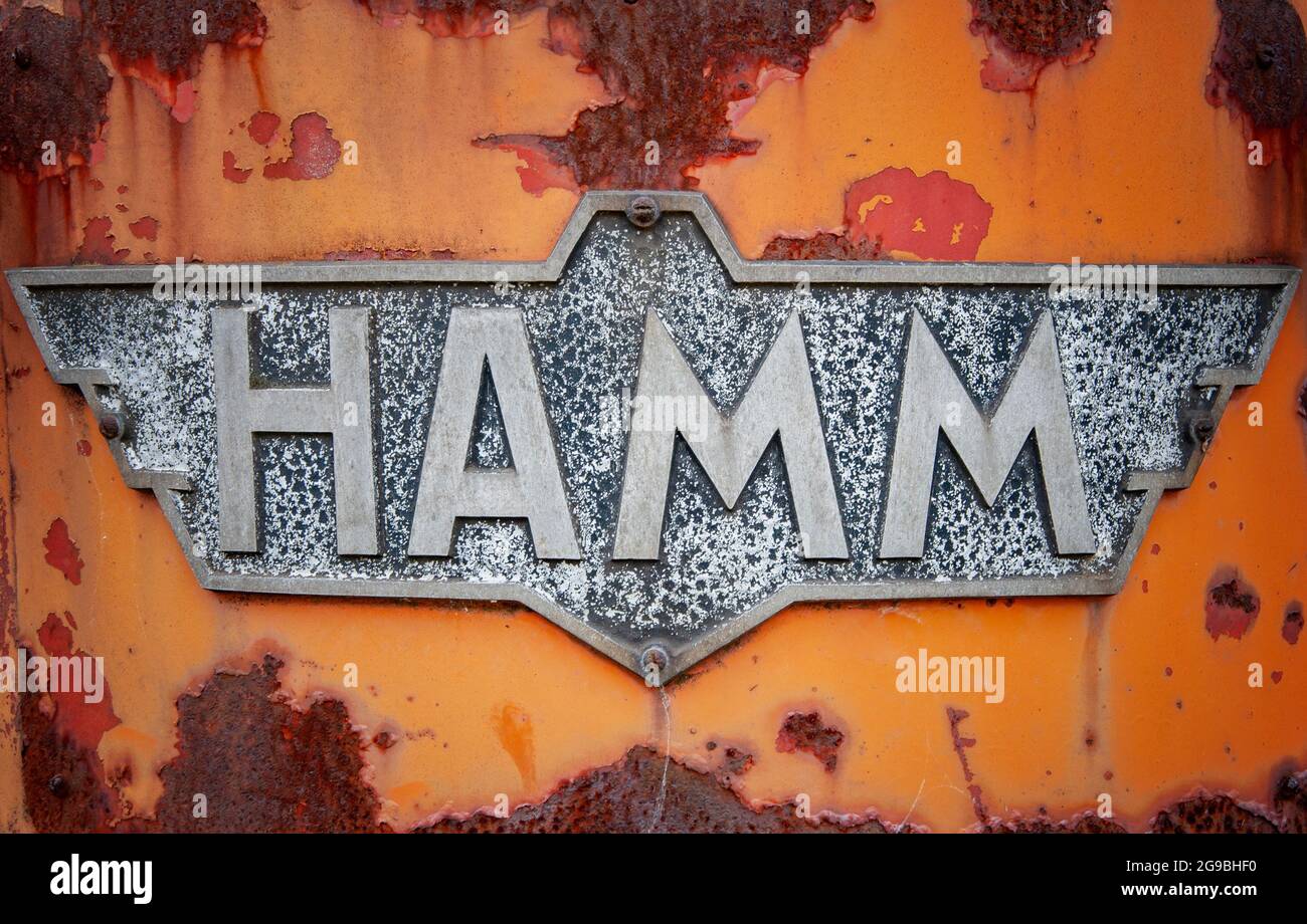 VERSMOLD, GERMANY. JUNE 20, 2021. Retro Hamm logo Orange rusted background Stock Photo