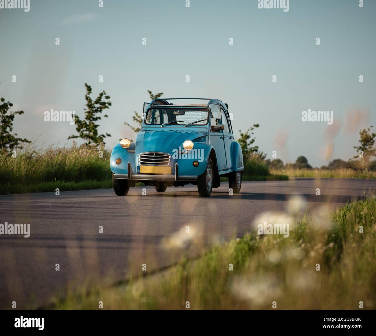 ZOETERMEER, NETHERLANDS - Jul 15, 2021: A Blue Citroen 2CV (Deux Chevaux) classic car on the road Stock Photo