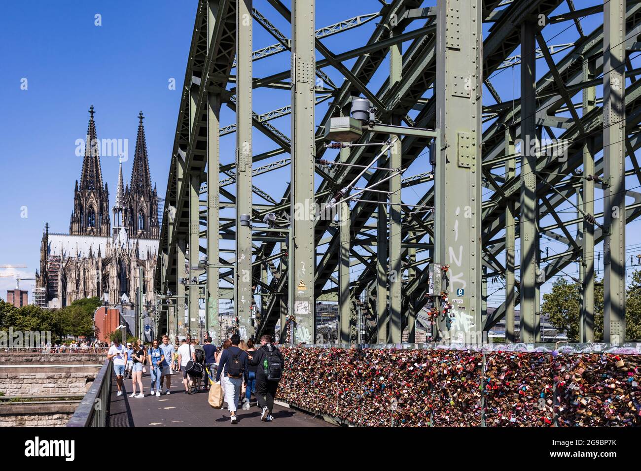 Love locks on Hohenzollern bridge, Cologne Cathedral, Kölner Dom, Cologne, North Rhine-Westphalia, Germany, Europe Stock Photo