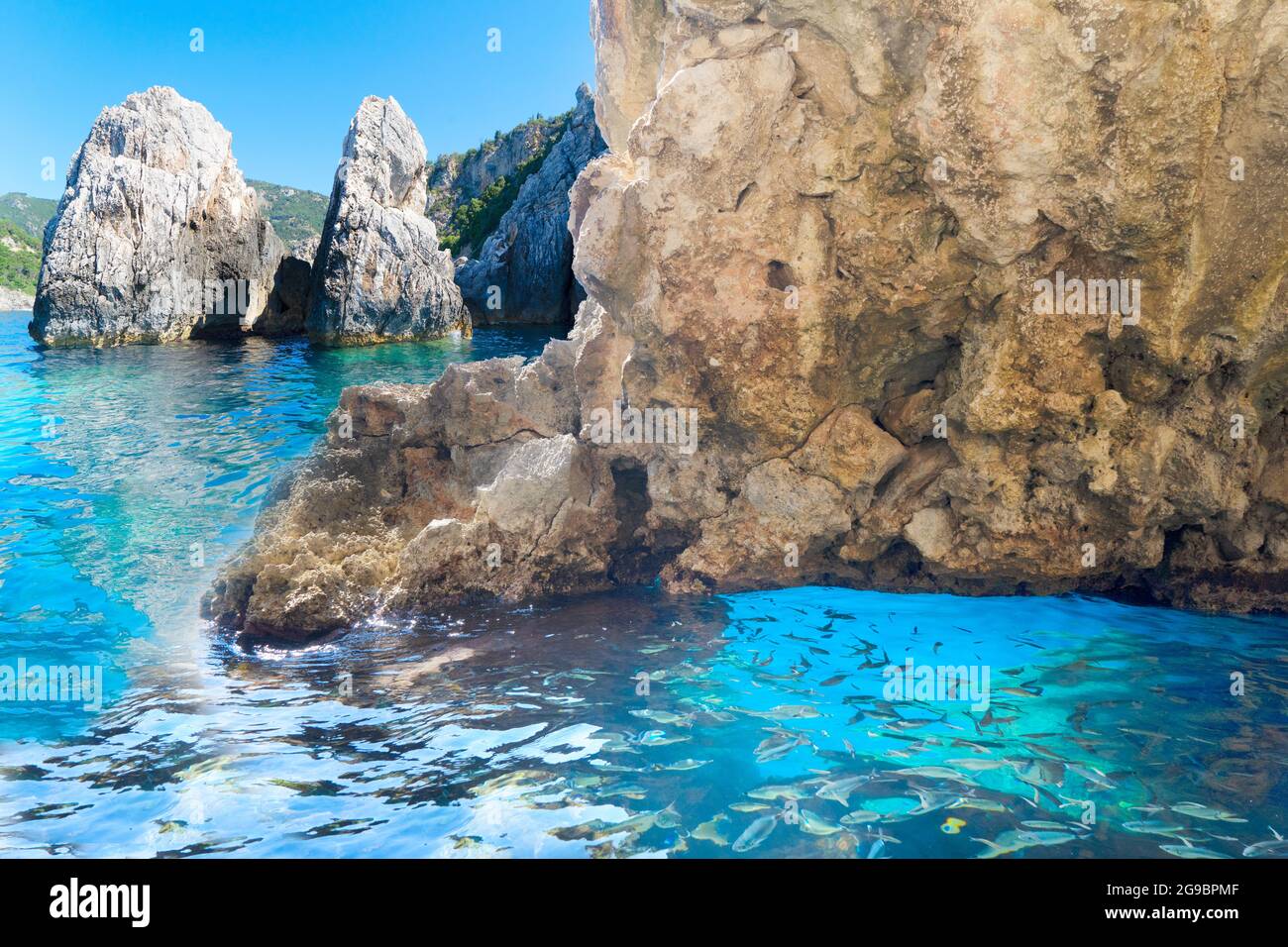 paleokastritsa-blue-caves-and-ionian-sea-on-korfu-greece-stock-photo