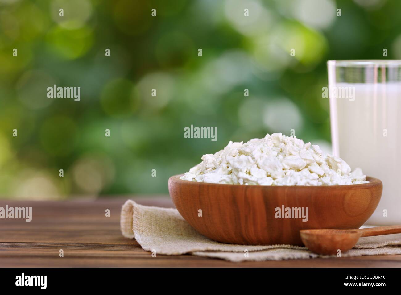 yogurt and cottage cheese on table outdoors Stock Photo