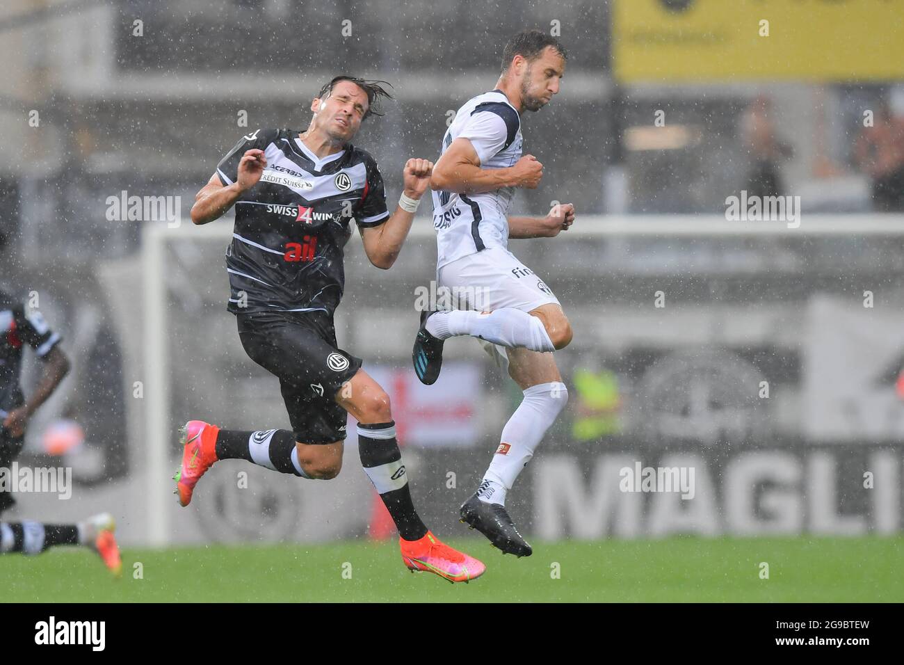 Lugano, Switzerland. 25th July, 2021. Mikael Facchinetti (#7 FC Lugano) and  Nikola Boranijasevic (#19 FC Zuerich) during the Super League match between FC  Lugano and FC Zuerich at Cornaredo Stadium in Lugano