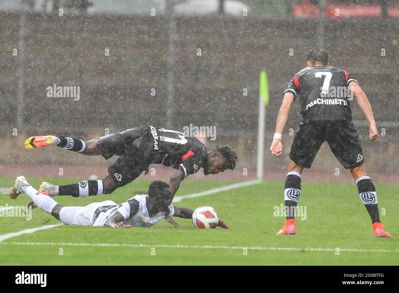 Lugano, Switzerland. 25th July, 2021. Mikael Facchinetti (#7 FC Lugano) and  Nikola Boranijasevic (#19 FC Zuerich) during the Super League match between FC  Lugano and FC Zuerich at Cornaredo Stadium in Lugano