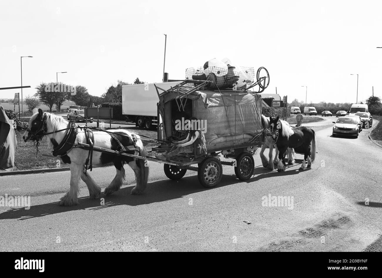 Romany travellers family on the road at Sutton Maddock in Shropshire