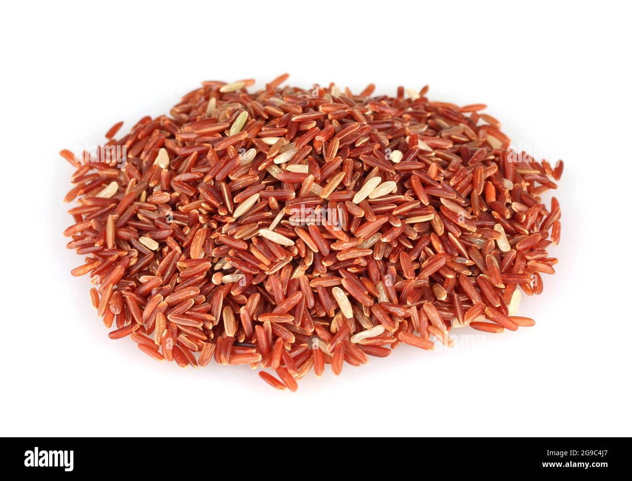 Partially Red Rice red rice uncooked in a heap isolated on a white background Stock Photo ...
