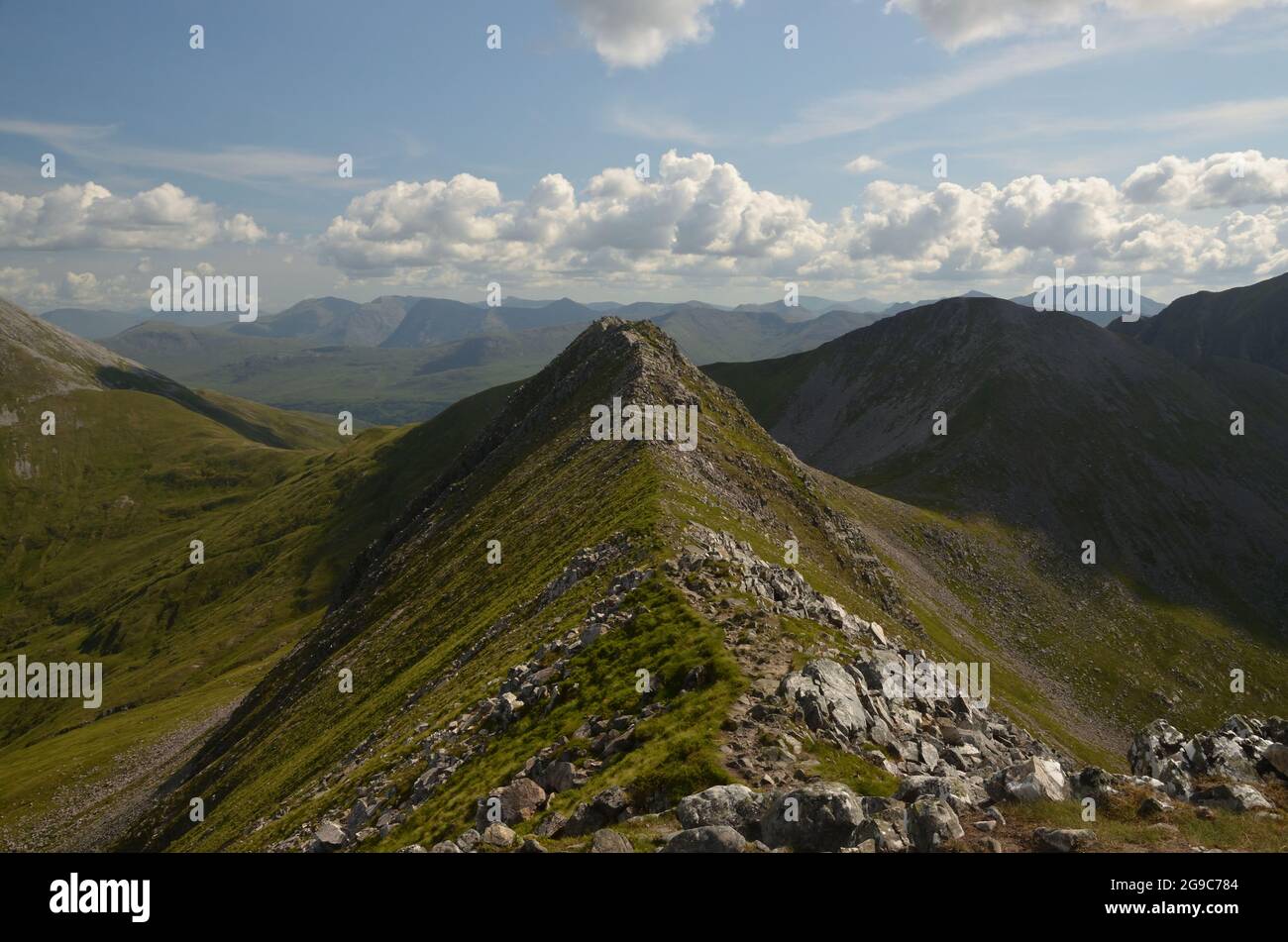 The ridge between the mountains An Gearanach and An Garbhanach, part of the circuit known as the 'Ring of Steall' in the Scottish Highlands, UK. Stock Photo