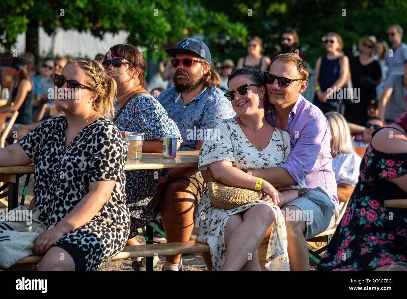 Audience enjoying beverages and music at open-air or outdoor concert Stock Photo
