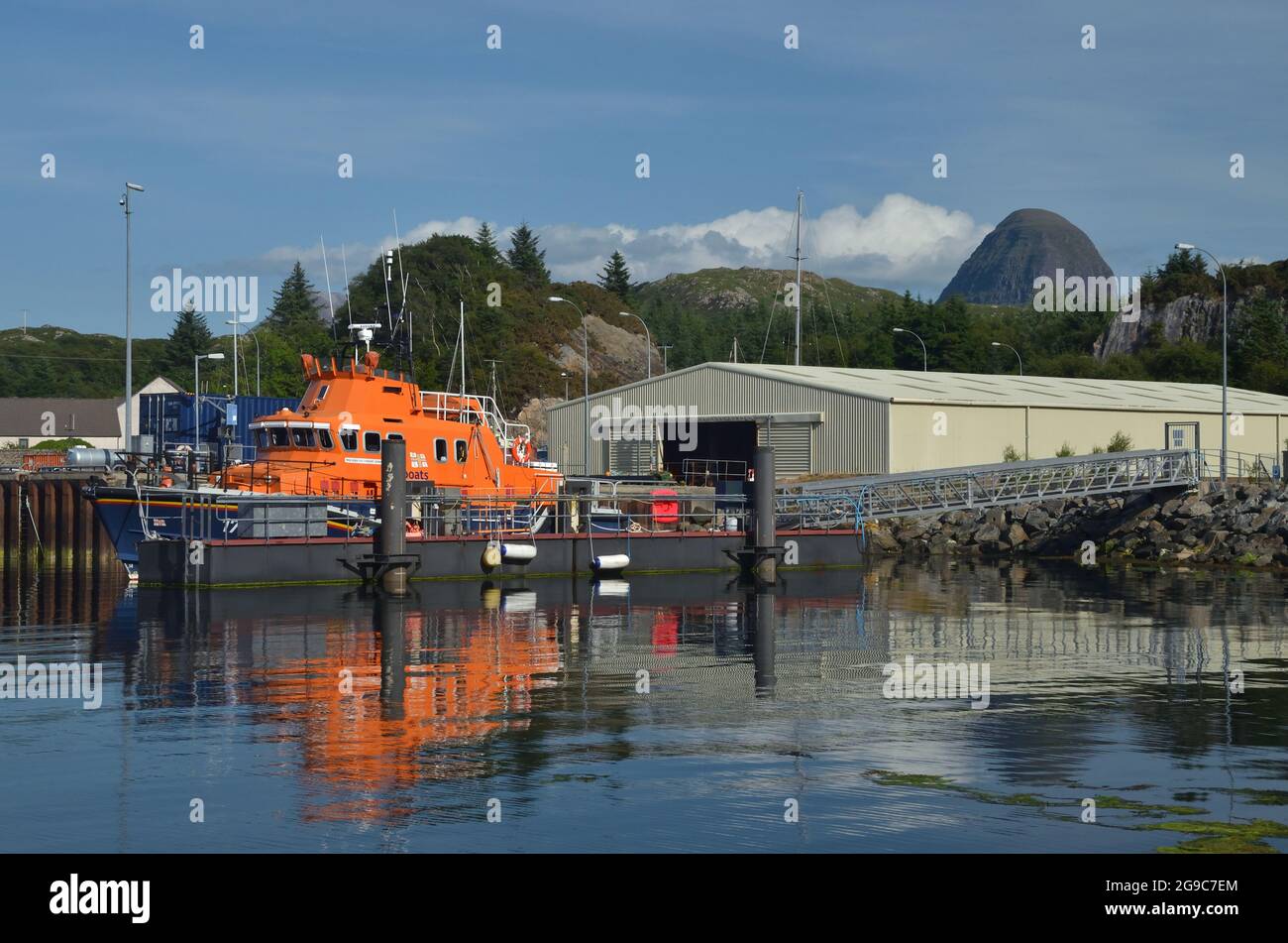 The RNLI lifeboat at Lochinver Harbour, Scotland, UK Stock Photo