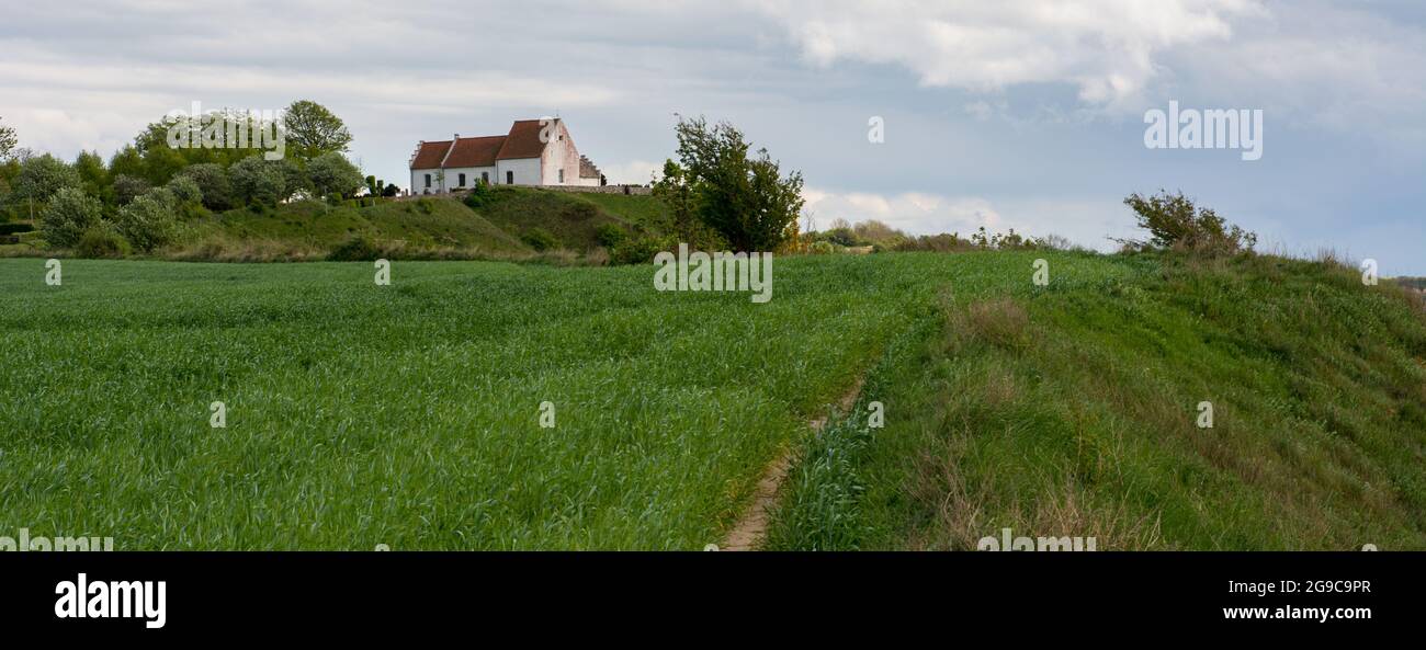 St. Ibb's medieval church on the island Ven in Sweden as seen on a hill in the distance Stock Photo