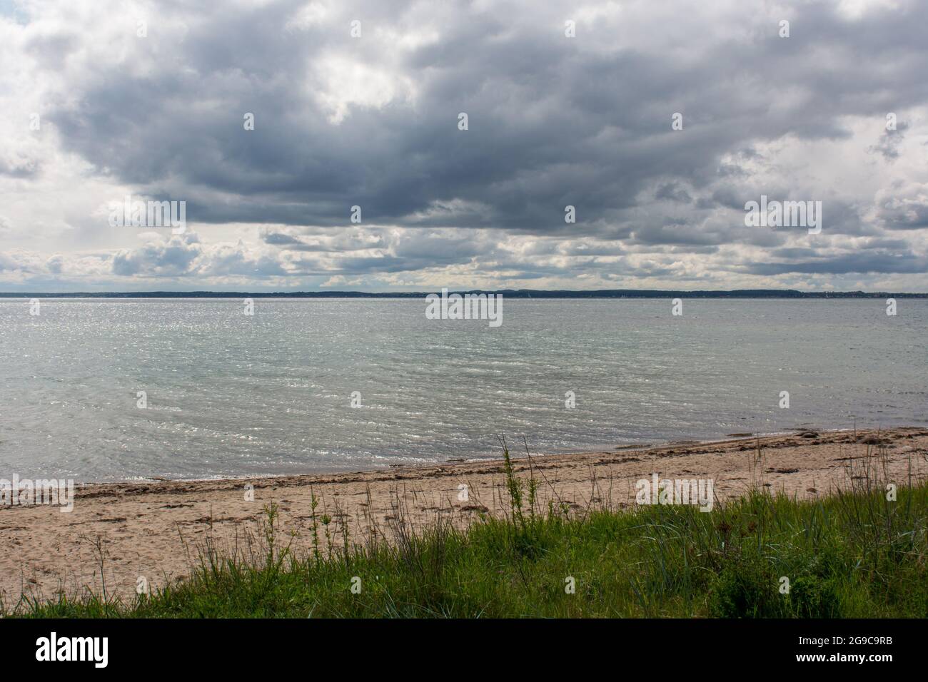 Coastline on the island Ven with beach and a view towards the danish coast Stock Photo