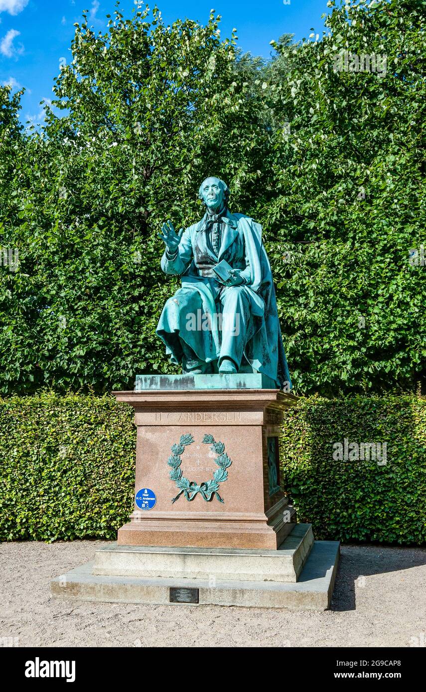 Statue of the Danish writer Hans Christian Andersen in the park of Rosenborg Castle, built in the Dutch Renaissance style in the 17th century. Stock Photo