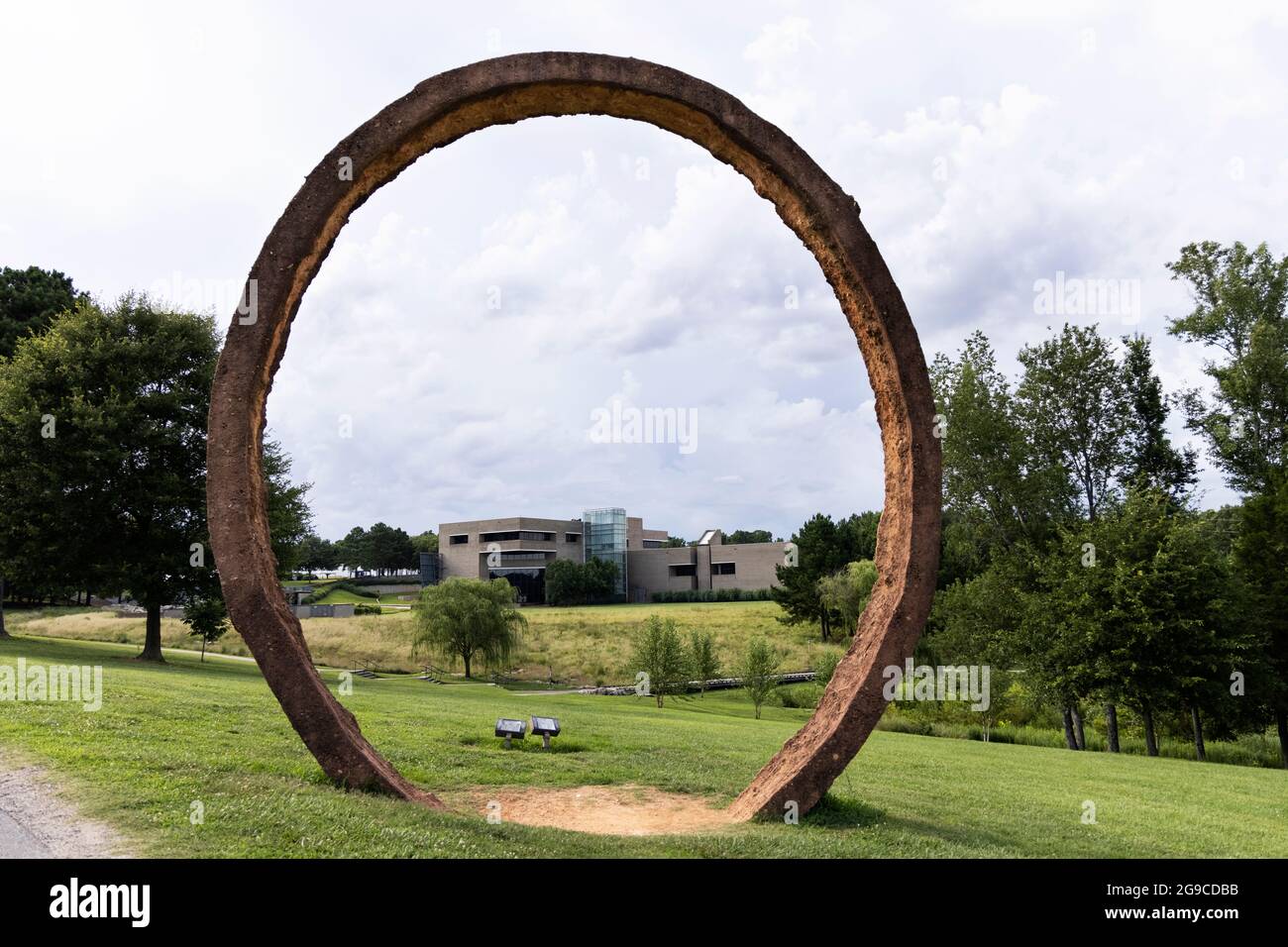 The North Carolina Museum of Art in Raleigh, NC, USA, as viewed through one of the circles of Thomas Sayre's large sculpture Gyre. Stock Photo