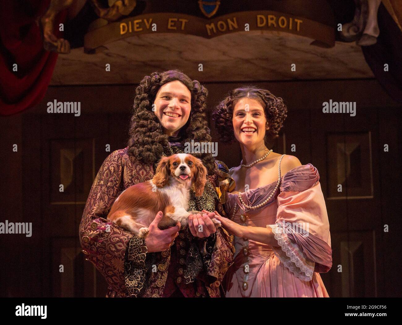 David Sturzaker (King Charles II), Gemma Arterton (Nell Gwynn) with Millie in NELL GWYNN by Jessica Swale at the Apollo Theatre, London W1  12/02/2016  a Shakespeare's Globe 2015 production  music: Nigel Hess design: Hugh Durrant lighting: Nick Richings choreographer: Charlotte Broom director: Christopher Luscombe Stock Photo