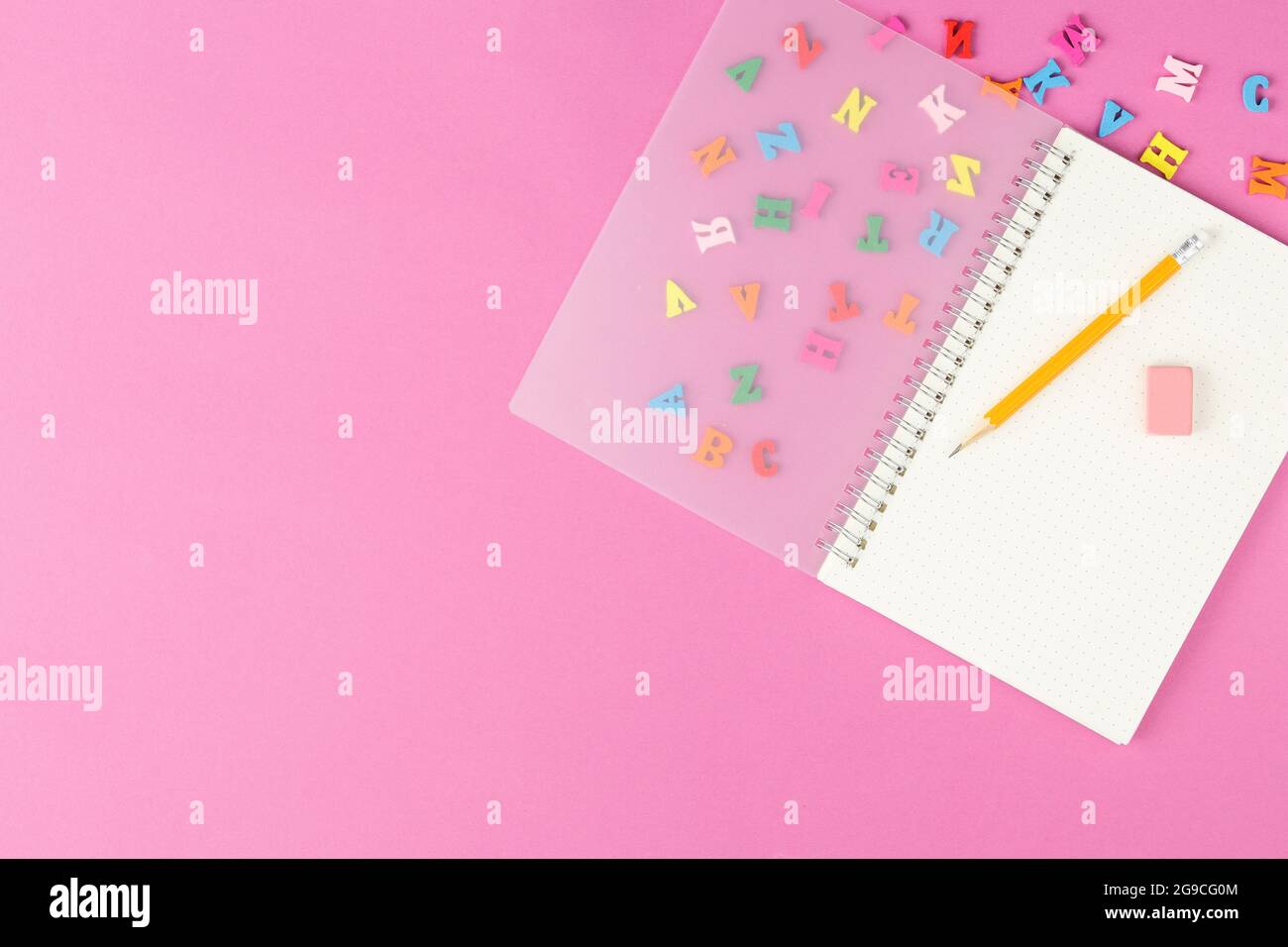 Spiral notepad with stationery on the desk. Stock Photo