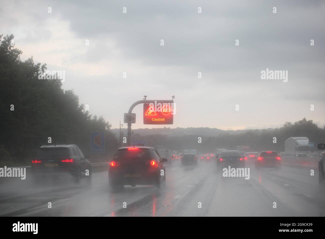 Road Hazards and Wet Driving Conditions Concept Cars driving along