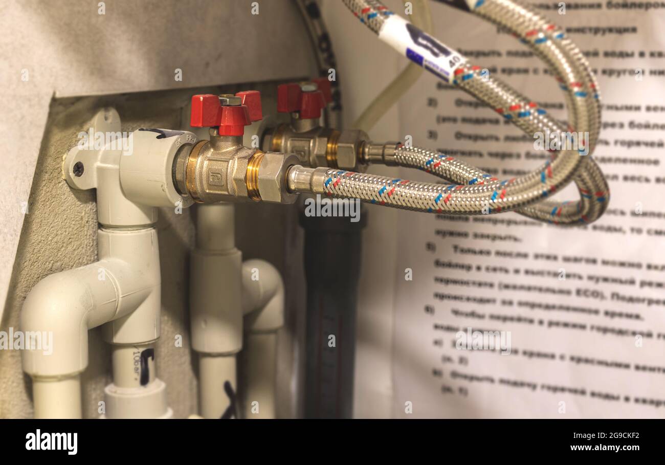 Water heater boiler equipment and valves closeup view for repairing and