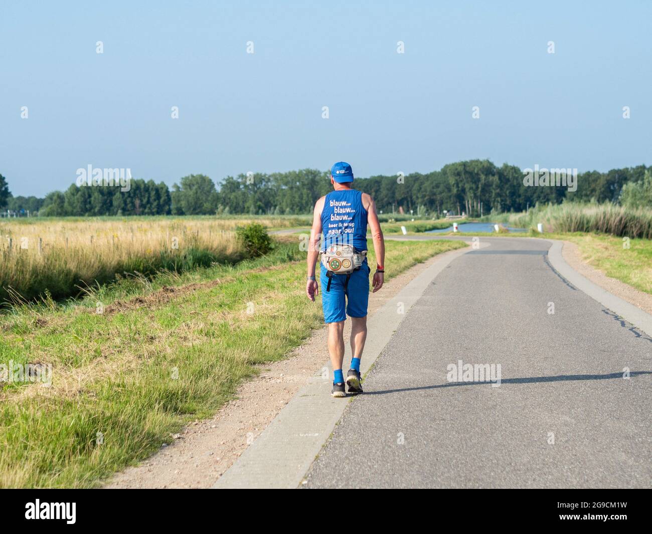 July 20, 2021, Nijmegen, Netherlands: A participant walks along the  official route during the event.The Vierdaagse, also known as The  International Four Days Marches, the largest multi-day walking event in the  world