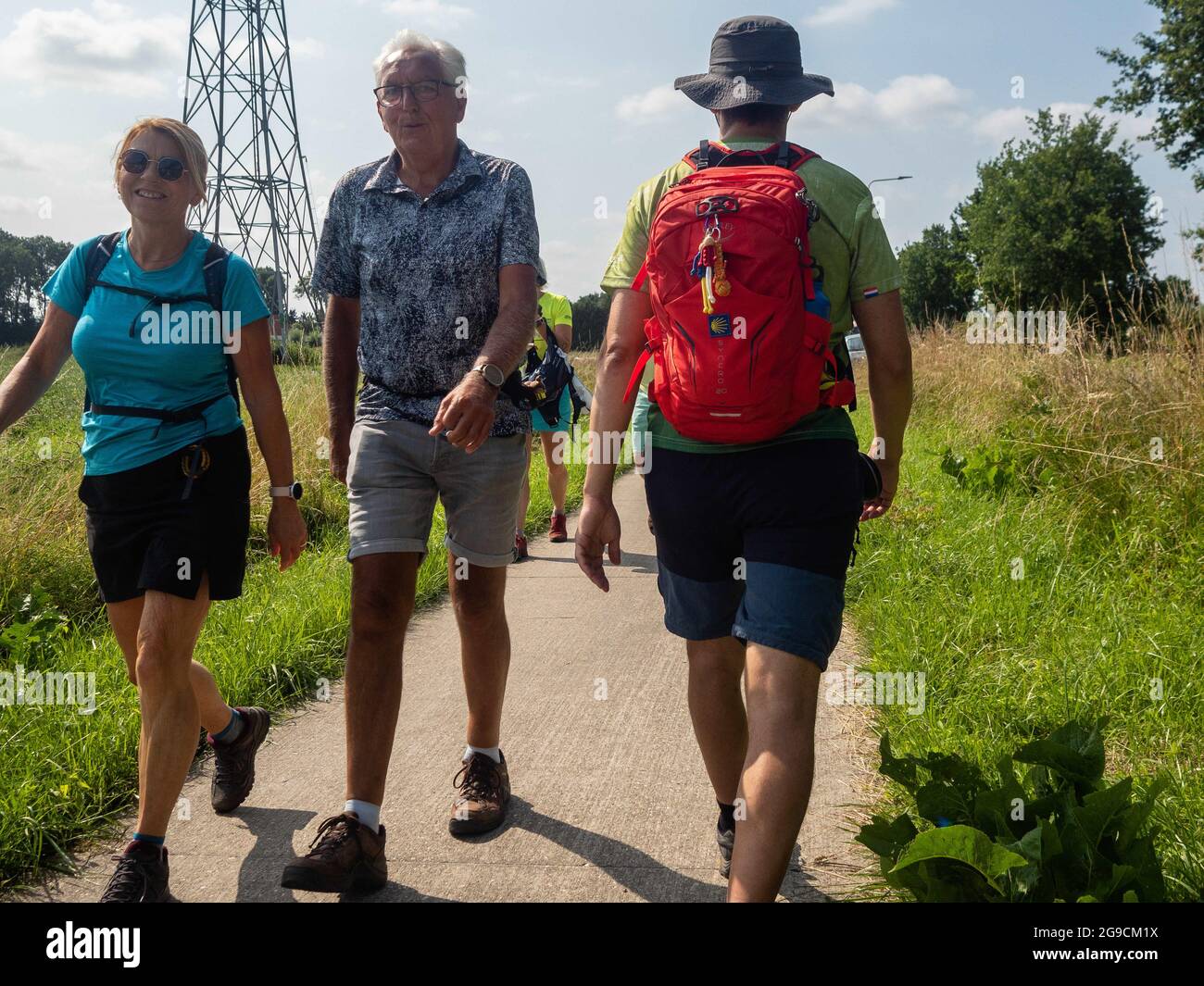 July 20, 2021, Nijmegen, Netherlands: Participants seen walking during the event.The Vierdaagse, also known as The International Four Days Marches, the largest multi-day walking event in the world that would be celebrated each year, but due to the current health situation, for the second year in a row, the event was canceled. However, the KWBN (Koninklijke Wandel Bond Nederland) organized the 'Alternative Vierdaagse', to which everybody could join, choosing a distance between 10 and 50 km, and a route somewhere in the Netherlands. Participation in the Alternative Four Days Marches is free. En Stock Photo