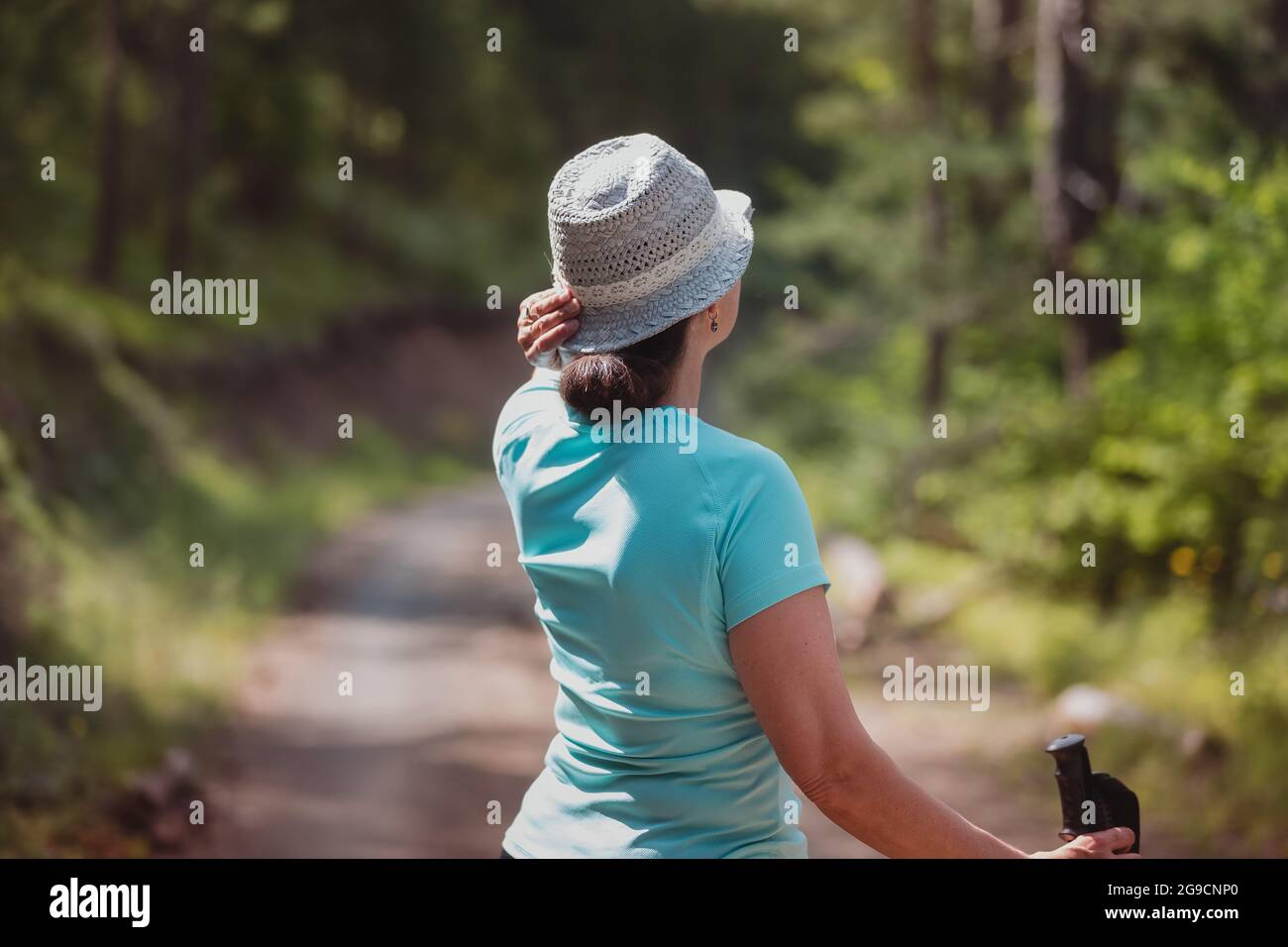 Mature woman walking forest hi-res stock photography and images - Alamy