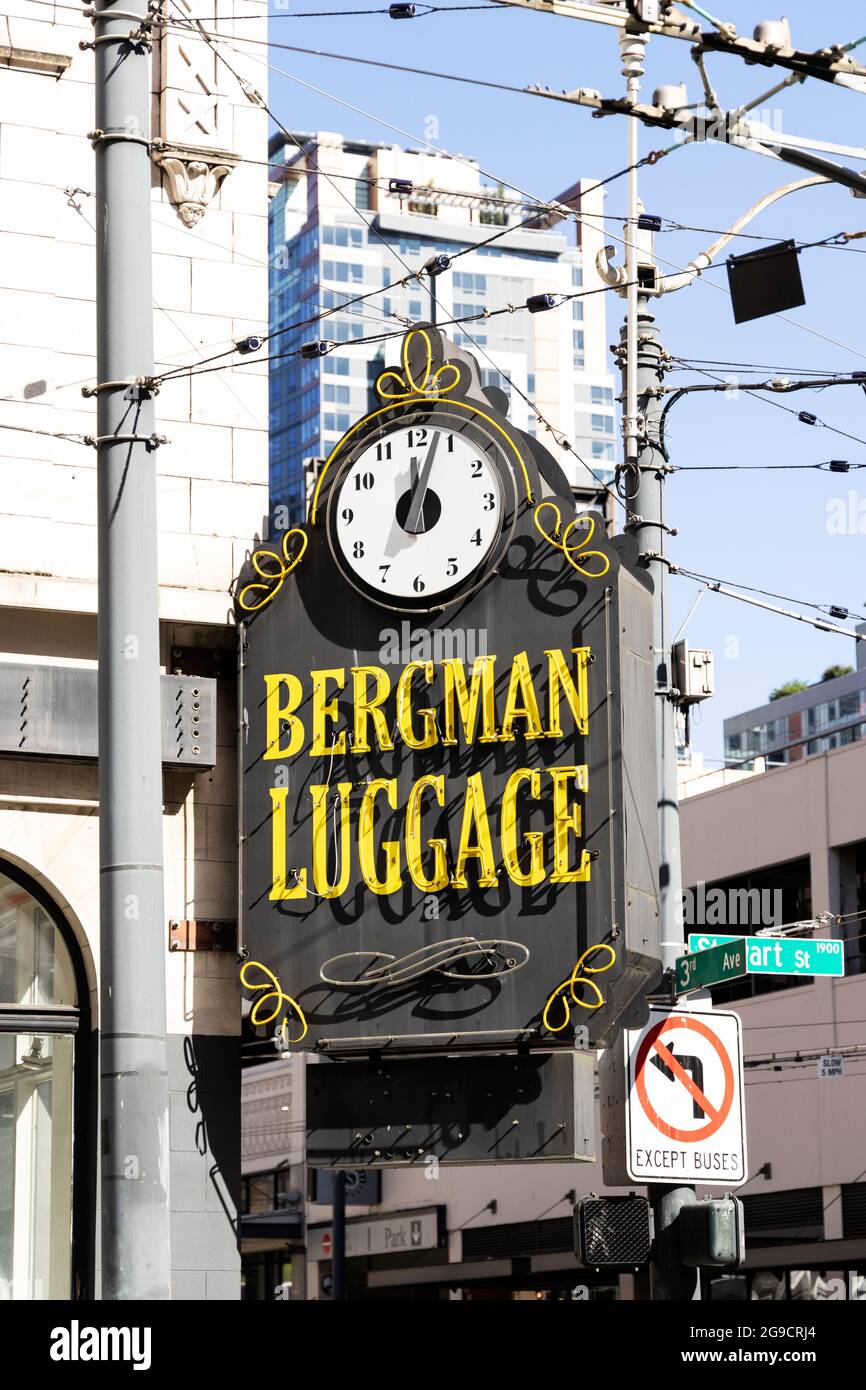 The Bergman Luggage sign and clock, on their building at Third Avenue ...