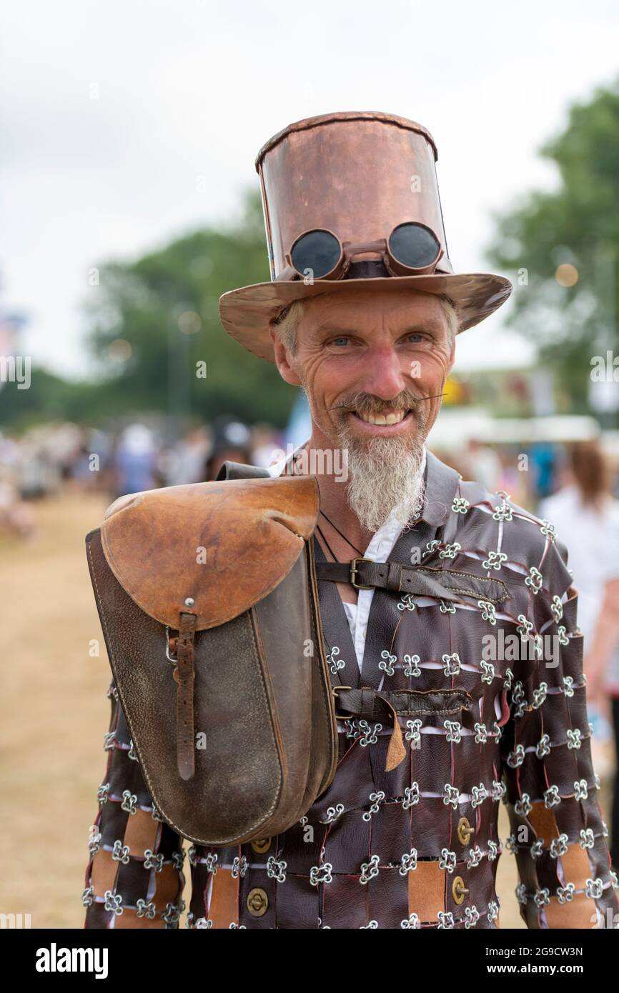 Standon, Hertfordshire, UK. 25th July, 2021. A music fan in a home made costume made during lockdown at Standon Calling Music festival taking place this weekend. It is one of the first festivals to be held after the relaxation of Covid restrictions in the UK and attendees had to take a verified and video recorded lateral flow test as a condition of entry. Credit: Julian Eales/Alamy Live News Stock Photo