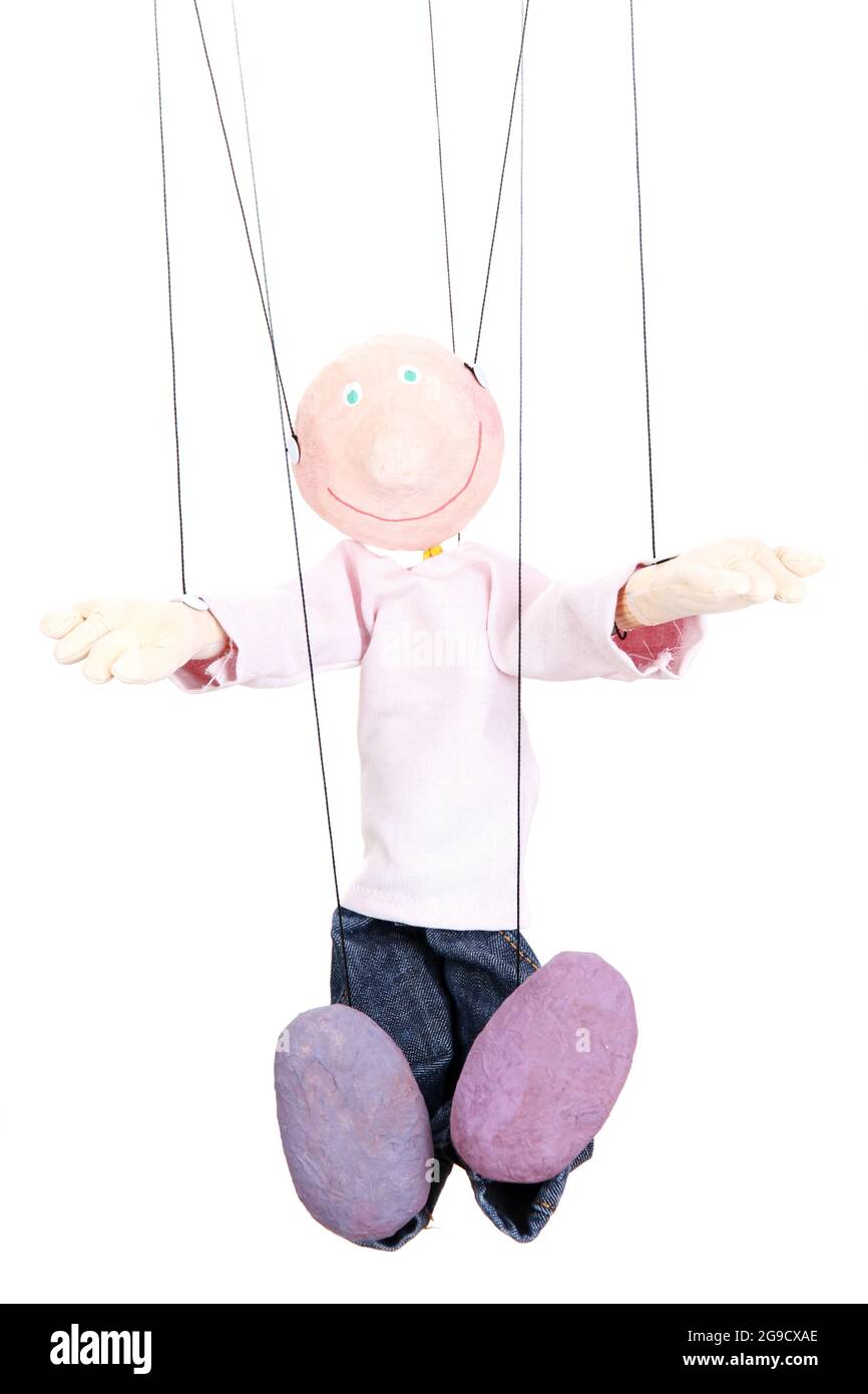 Wooden puppet isolated on white Stock Photo - Alamy