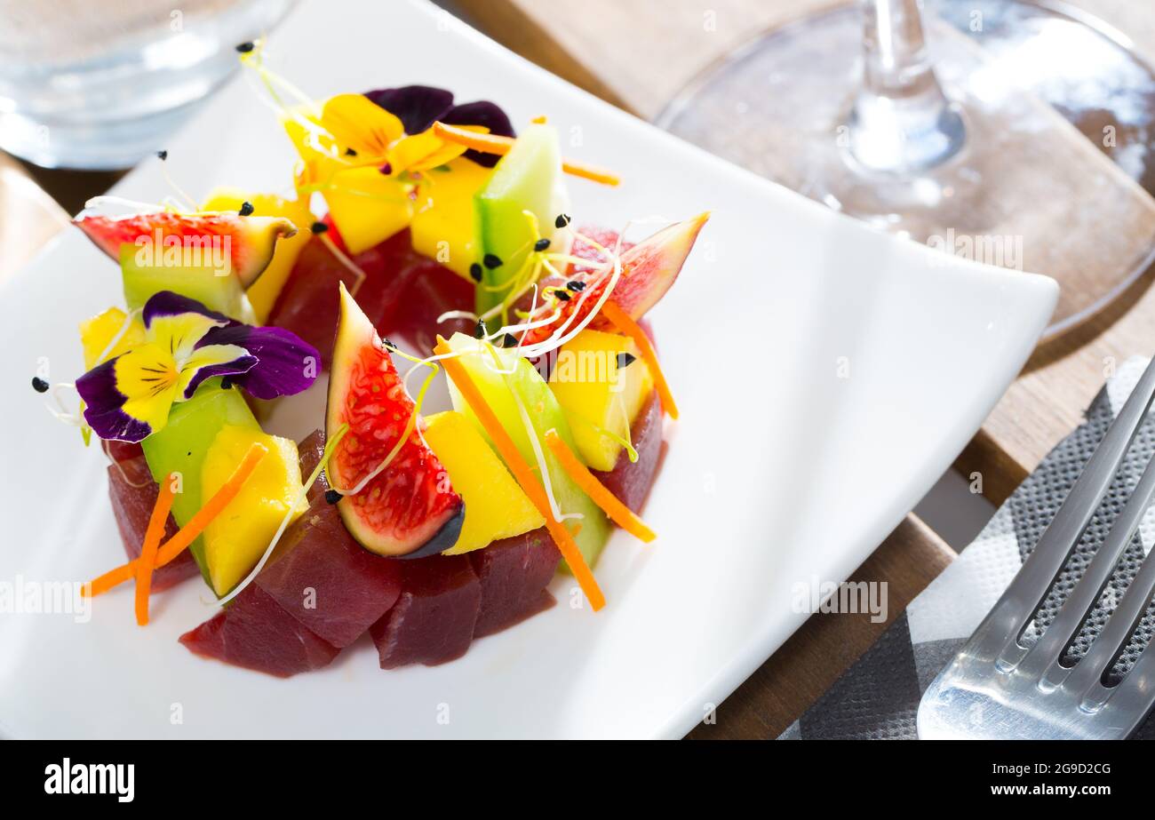 Tuna tartare with figs, cucumber Stock Photo Alamy