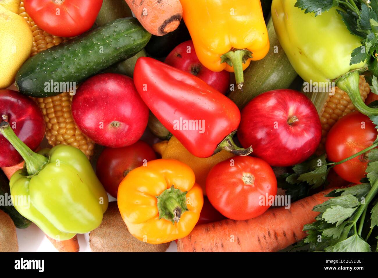 Assortment of fresh vegetables and fruits as a background Stock Photo