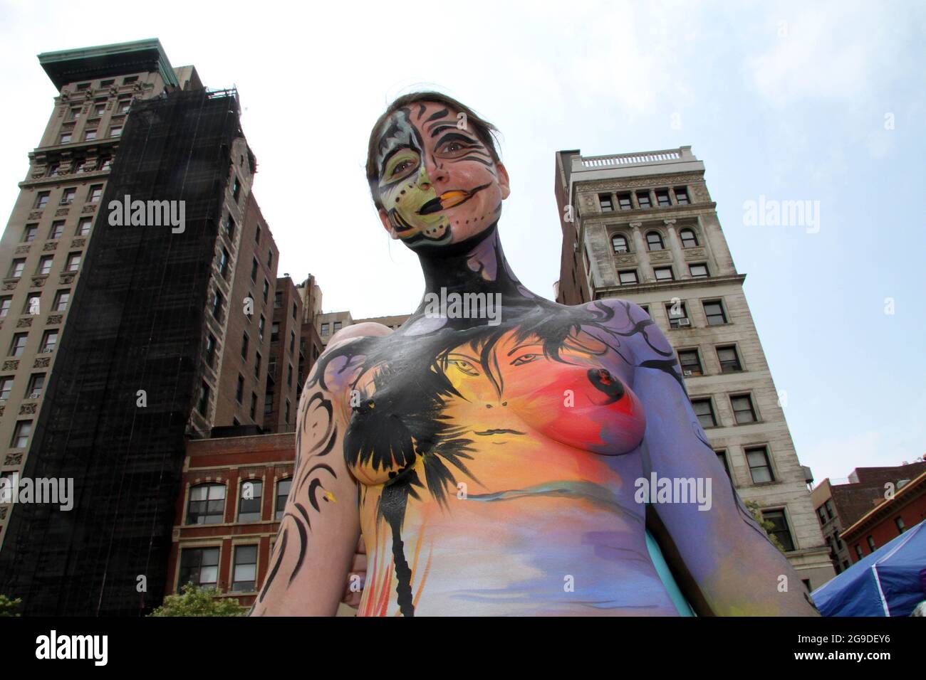 July 25, 2021, New York, New York, USA: New York 8th annual Body Painting Day.cover 50 artists and models came out to showcase there talent and paint living canvasses after the painting portion of the event they all walked down 5th ave to Washington Square park to pose for photographs and then boarded a Double Decker bus to Bushwick Brooklyn to celebrate. (Credit Image: © Bruce Cotler/ZUMA Press Wire) Stock Photo