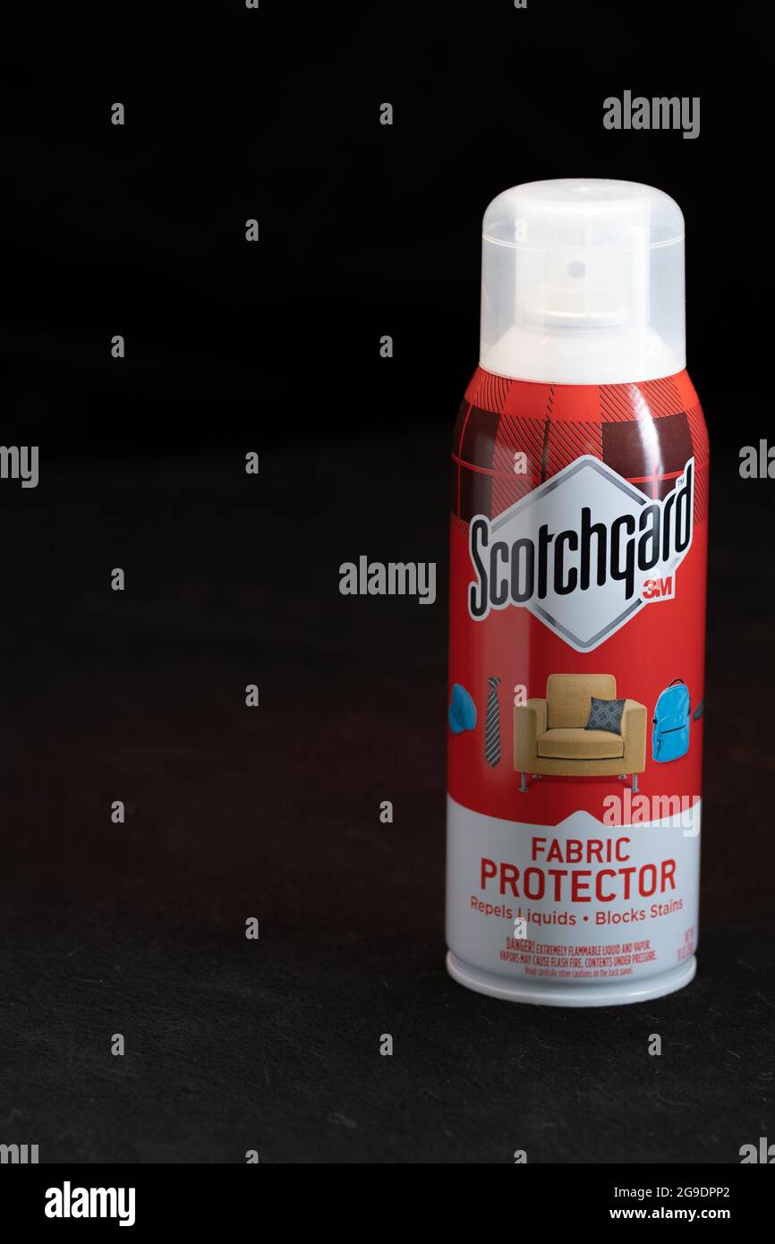 Spray can of Scotchguard fabric protector.  Scotchguard is a multipurpose water and stain repellant for fabric and other materials. Stock Photo