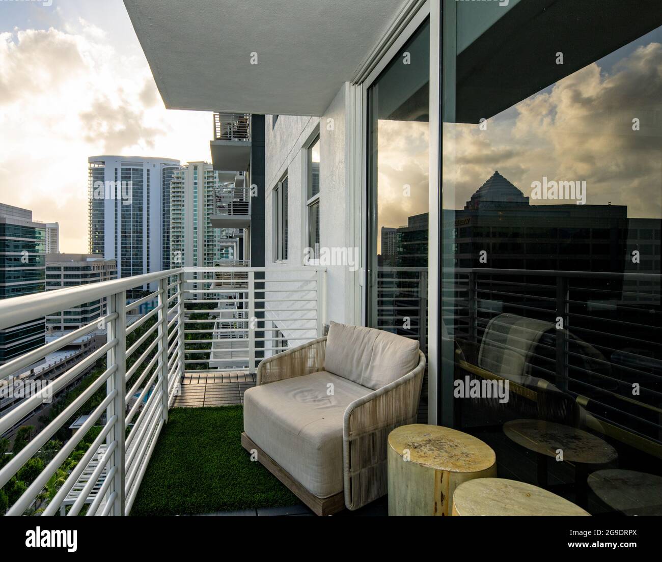 Condominium balcony at sunrise city scene Stock Photo - Alamy