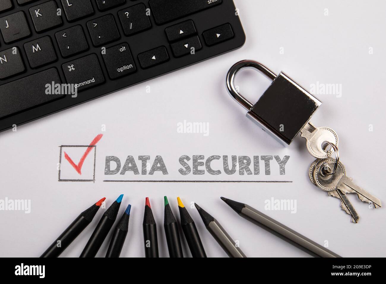 Data Security concept. Padlock and computer keyboard on the office desk  Stock Photo - Alamy