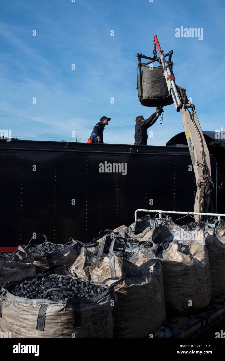 Steam engine loading coal Stock Photo Alamy