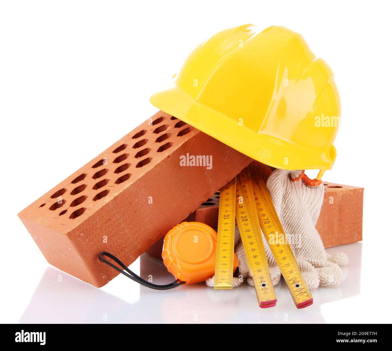 helmet, roulette, bricks and gloves isolated on white Stock Photo Alamy
