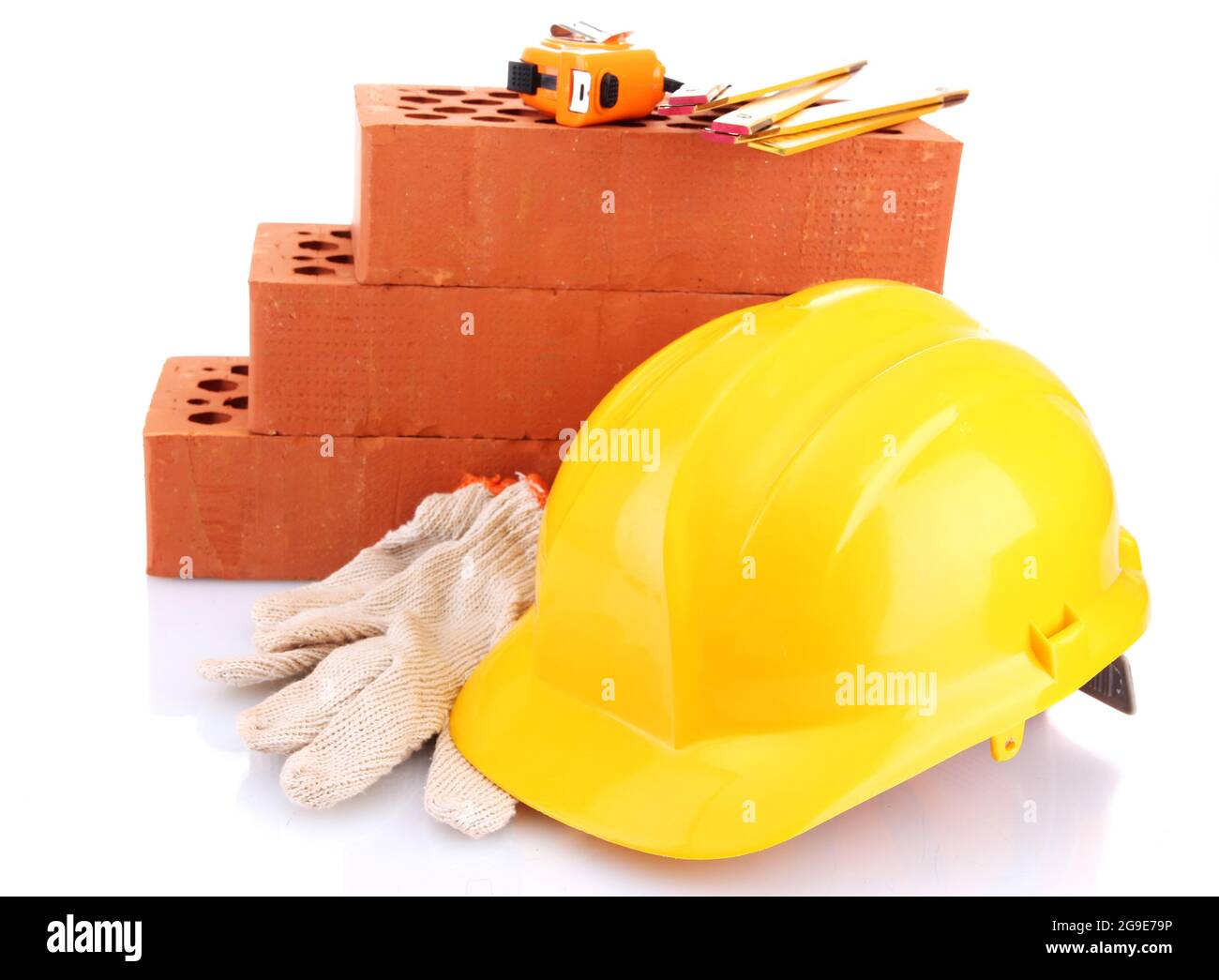 helmet, roulette, bricks and gloves isolated on white Stock Photo Alamy