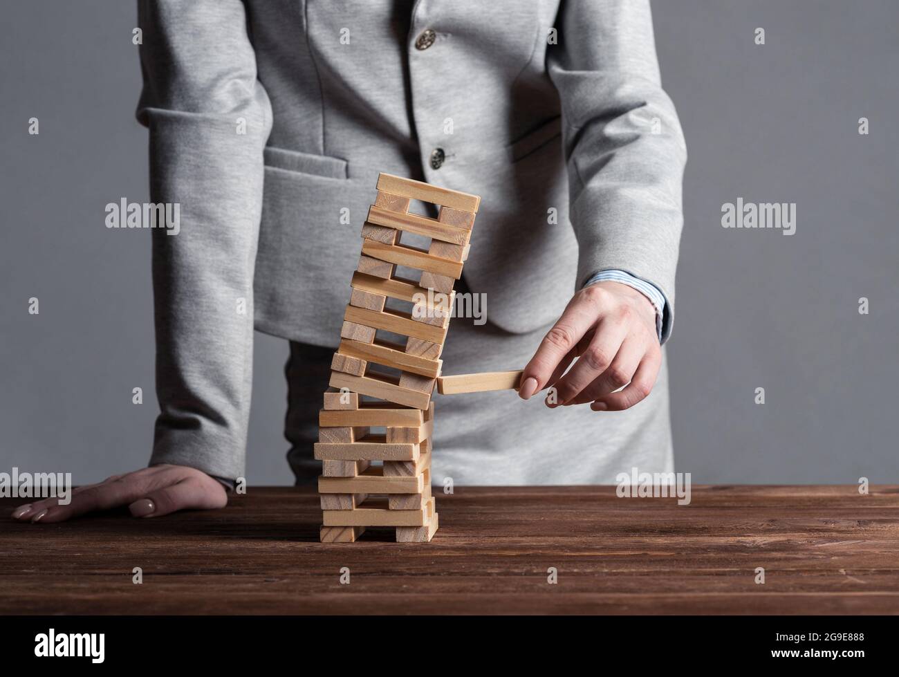 Removing block tower hi-res stock photography and images - Alamy