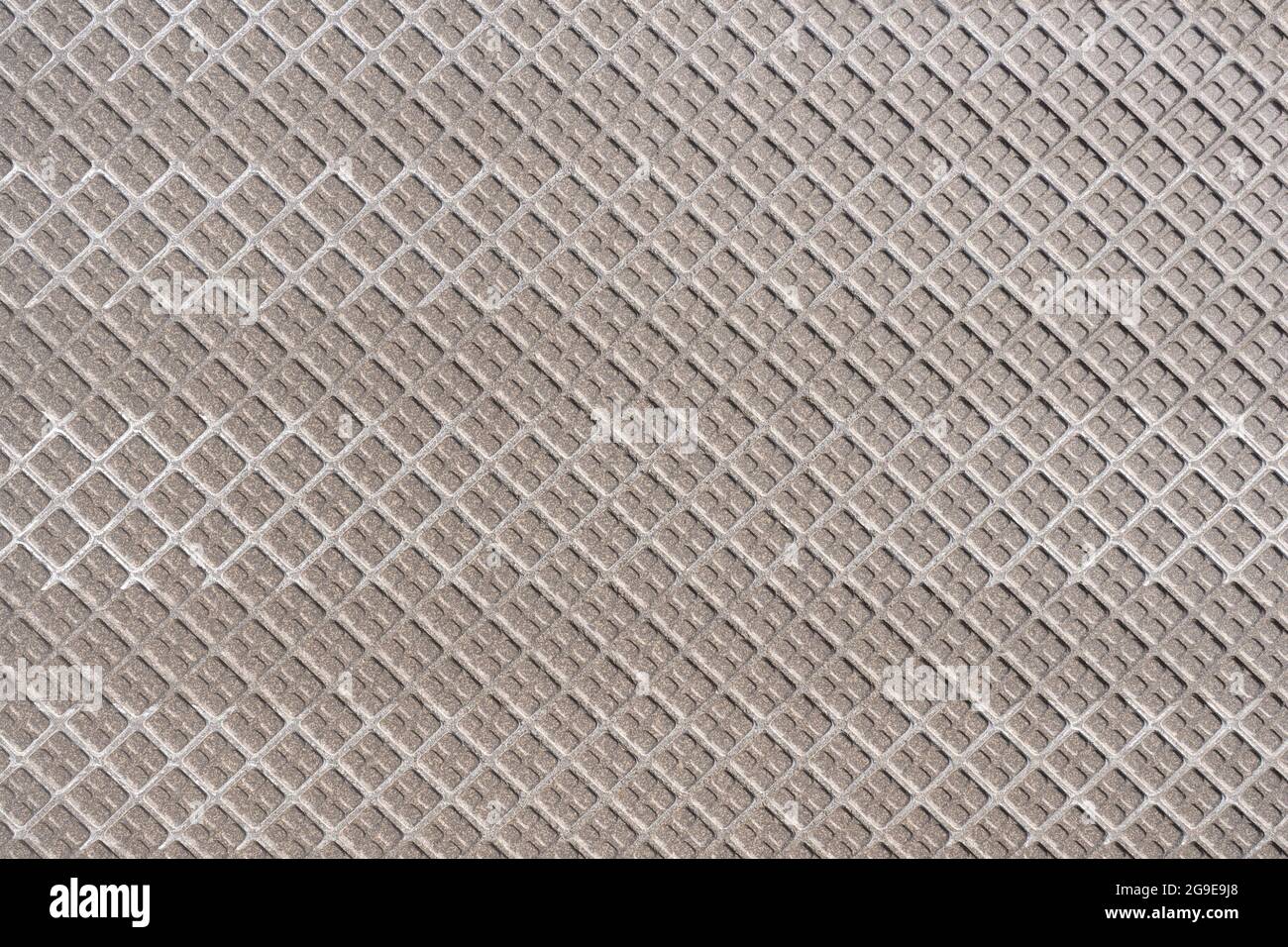 Back side of a large tile with pattern of squares Stock Photo