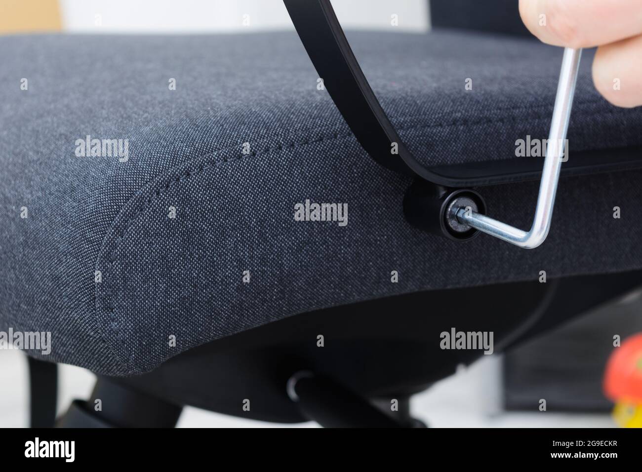 Man hands screw chair handle Assembling chair Step by step instructions