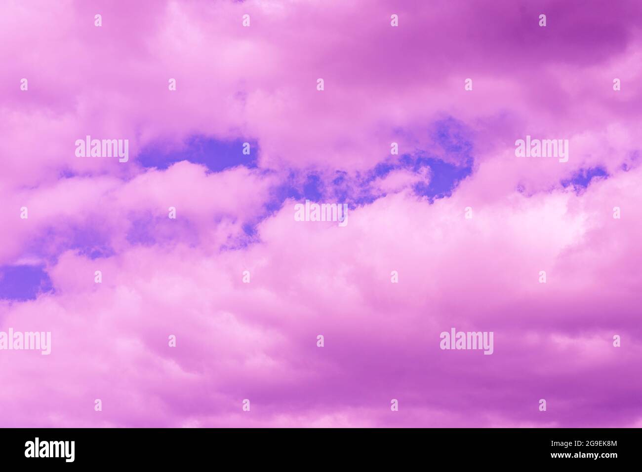 Beautiful dramatic pink cloud purple sky and violet filter Background.Toned  Stock Photo - Alamy