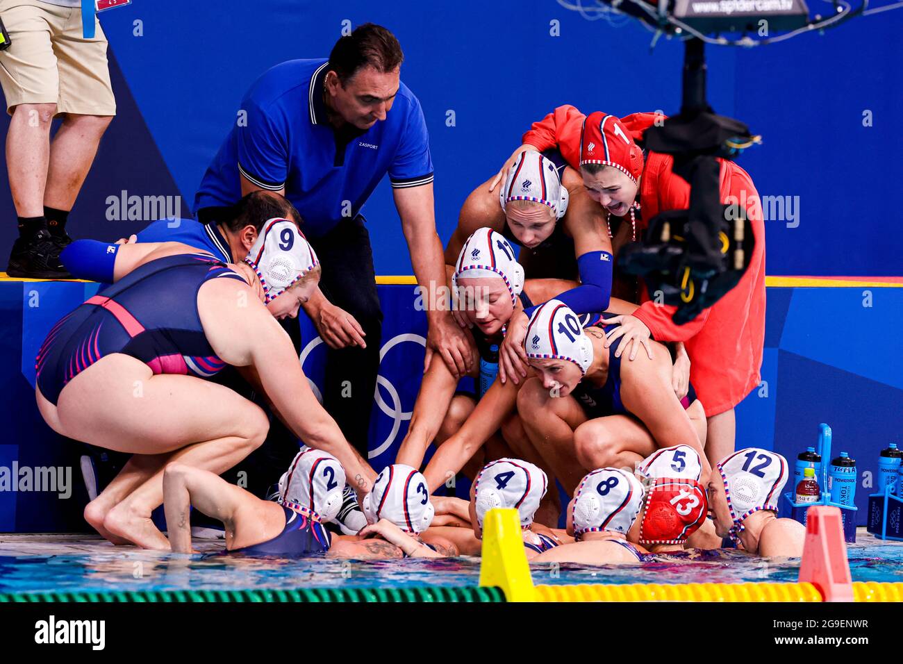 TOKYO, JAPAN - JULY 26: (back L-R) Anna Timofeeva of ROC, Andrei Belofastov of ROC, Head Coach Aleksandr Gaidukov of ROC, Evgeniya Ivanova of ROC, Alena Serzhantova of ROC, Evgeniya Soboleva of ROC, Evgeniia Golovina of ROC (frnt L-R) Mariia Bersneva of ROC, Ekaterina Prokofyeva of ROC, Elvina Karimova of ROC, Anastasia Simanovich of ROC, Veronika Vakhitova of ROC, Anna Karnaukh of ROC, Nadezhda Glyzina of ROC during the Tokyo 2020 Olympic Waterpolo Tournament Women match between Team ROC and Team Hungary at Tatsumi Waterpolo Centre on July 26, 2021 in Tokyo, Japan (Photo by Marcel ter Bals/Or Stock Photo