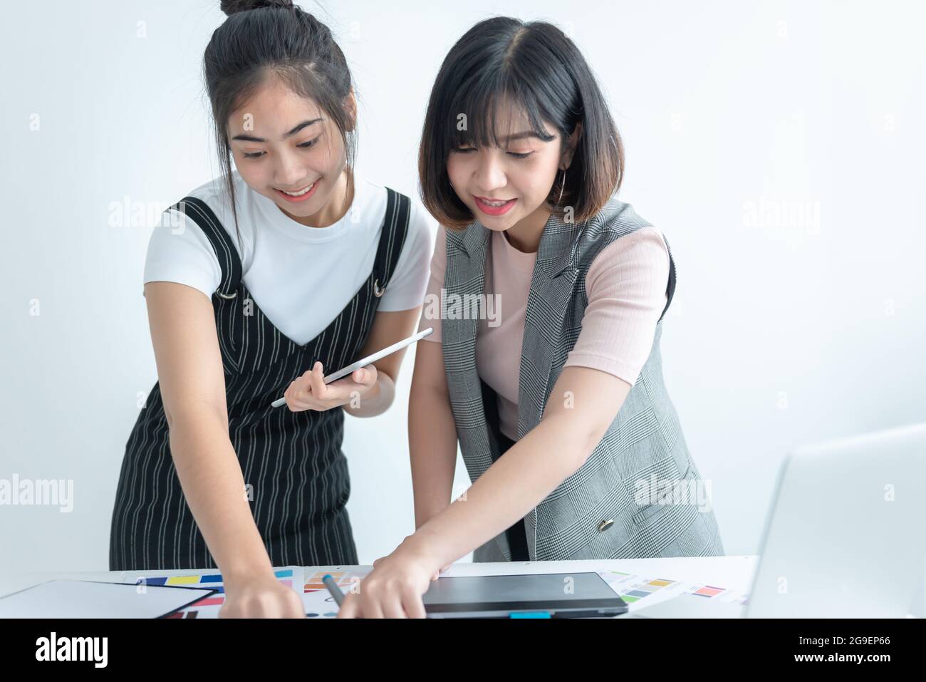 Team Fashion designer stylish showroom concept, they are designing the color of the clothes Stock Photo