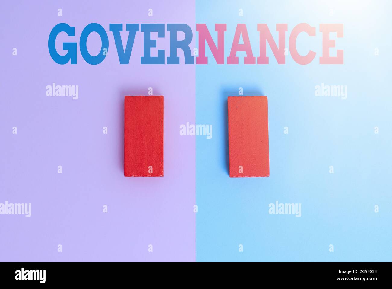 Handwriting text Governance. Word Written on exercised in handling an economic situation in a nation Two Objects Arranged Facing Inward Outward On a Stock Photo
