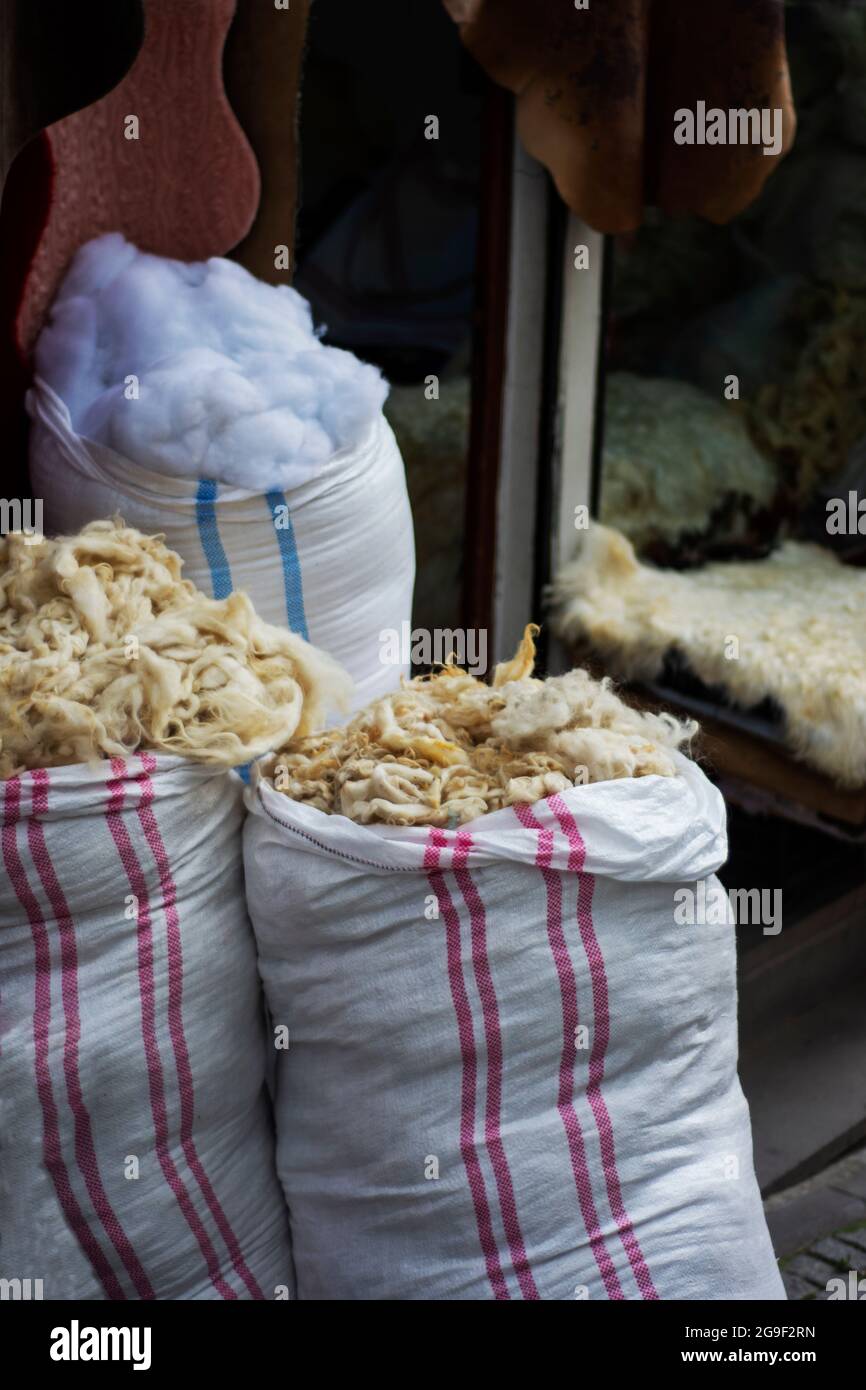 Sale of raw wool, fiber and raw cotton in sacks Stock Photo