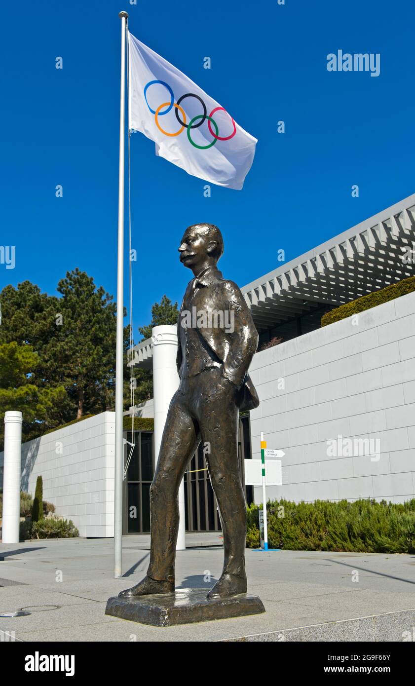 Pierre de Coubertin statue and the Olympic Flag, Olympic Museum, Lausanne, Switzerland Stock Photo