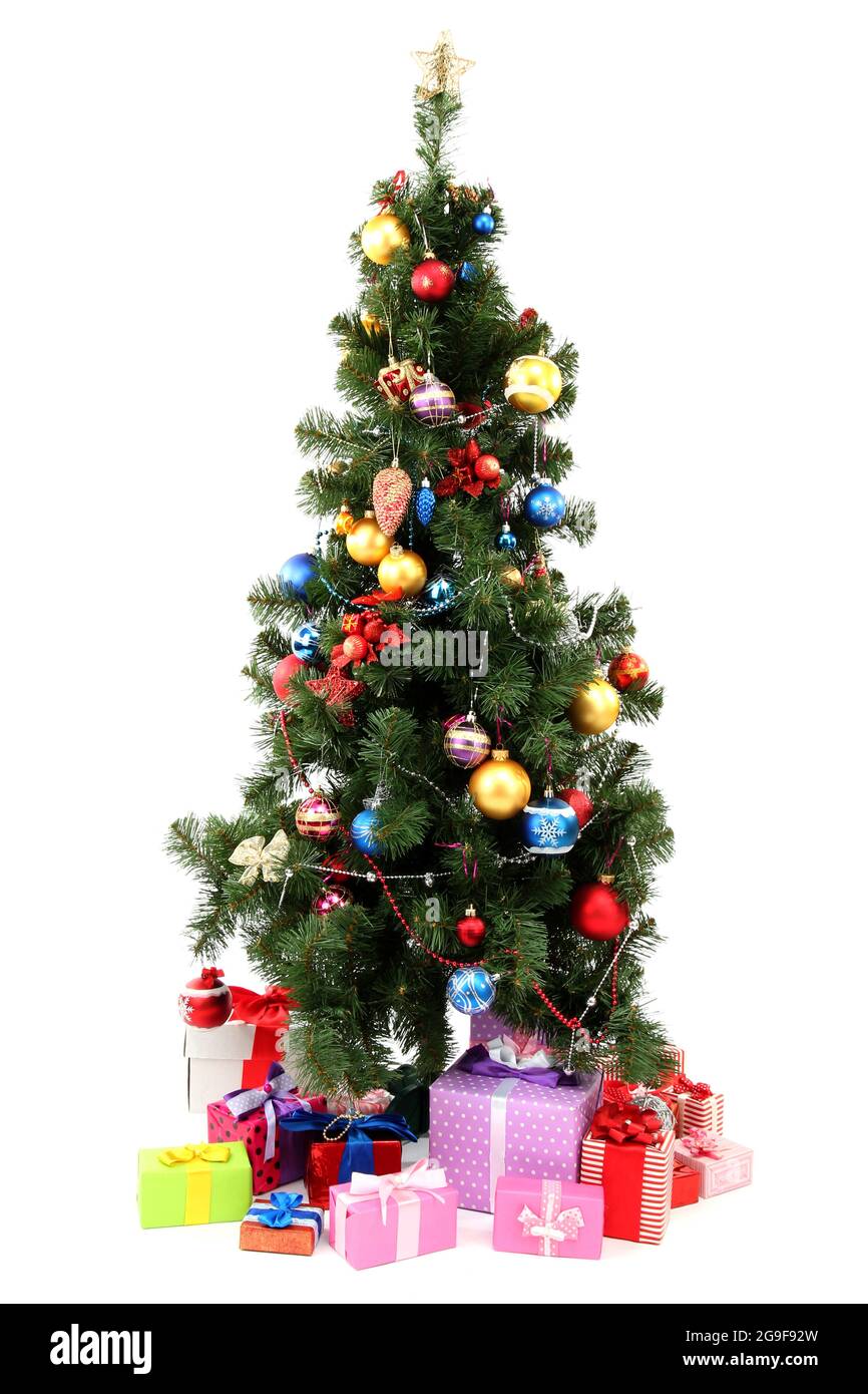 Decorated Christmas tree with gifts isolated on white Stock Photo - Alamy