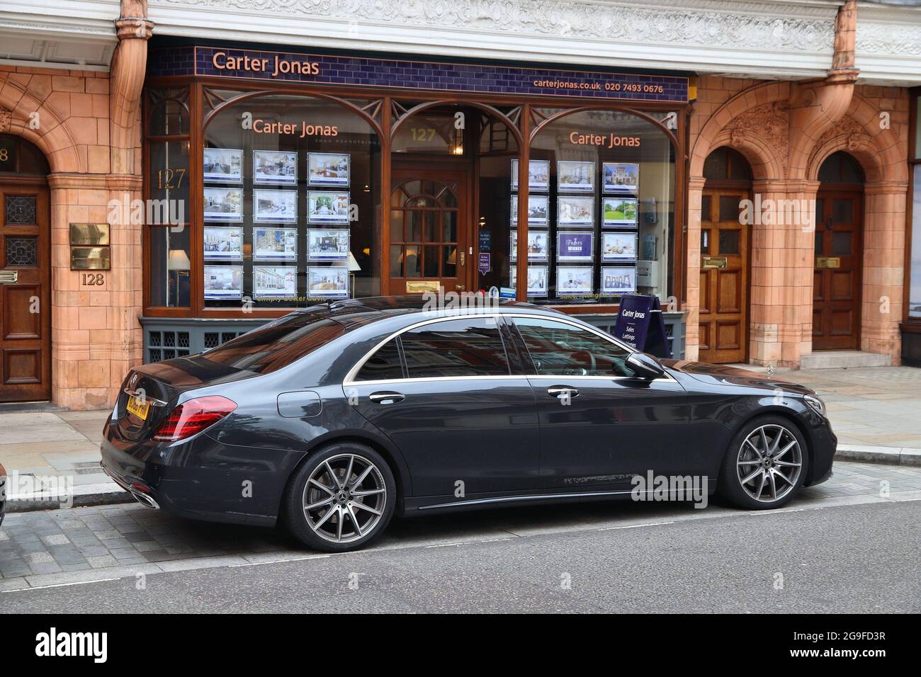 LONDON, UK - JULY 15, 2019: Mercedes-Benz S-Class (W222) luxury executive car parked in London. There are 37.7 million vehicles registered in the UK. Stock Photo