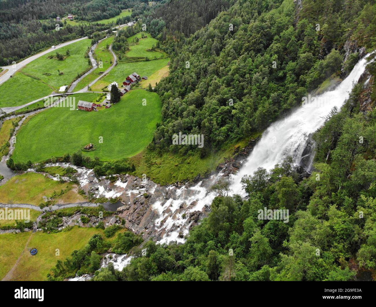 Beautiful place in Norway. Tvindefossen waterfall in Skulestadmo, Norway. Drone aerial view. Stock Photo