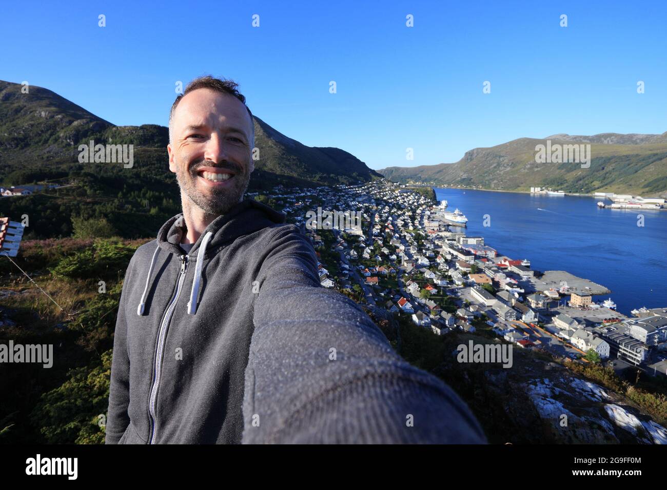 Selfie in Norway town of Maloy (Vagsoy island). Male adult traveler. Stock Photo