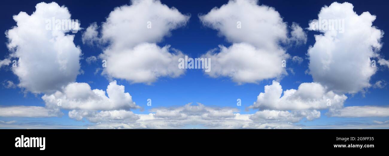 Panoramic sky background. White clouds blue sky background. White cumulus clouds texture. Stock Photo